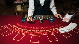 Mobile app showing live roulette table with betting interface and payment options